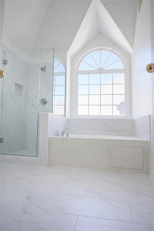 1209 Wildcliff Circle, Unit 100 Atlanta, GA 30329 - Photo 10 of 21 wooden floor with a bathtub in a spacious bathroom