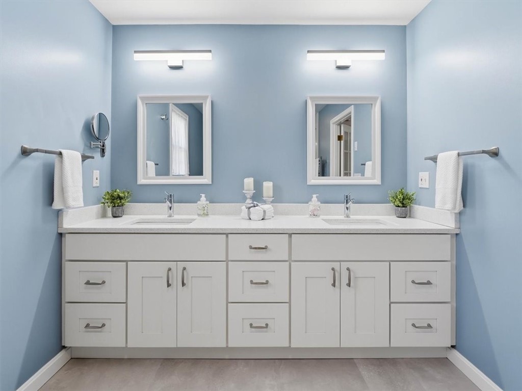 32 Lisa Lane Hopkinton, RI 02832 - Photo 32 of 50 The oversized layout provides room to breathe, anchored by a beautiful double vanity w/ quartz counters & ample storage.