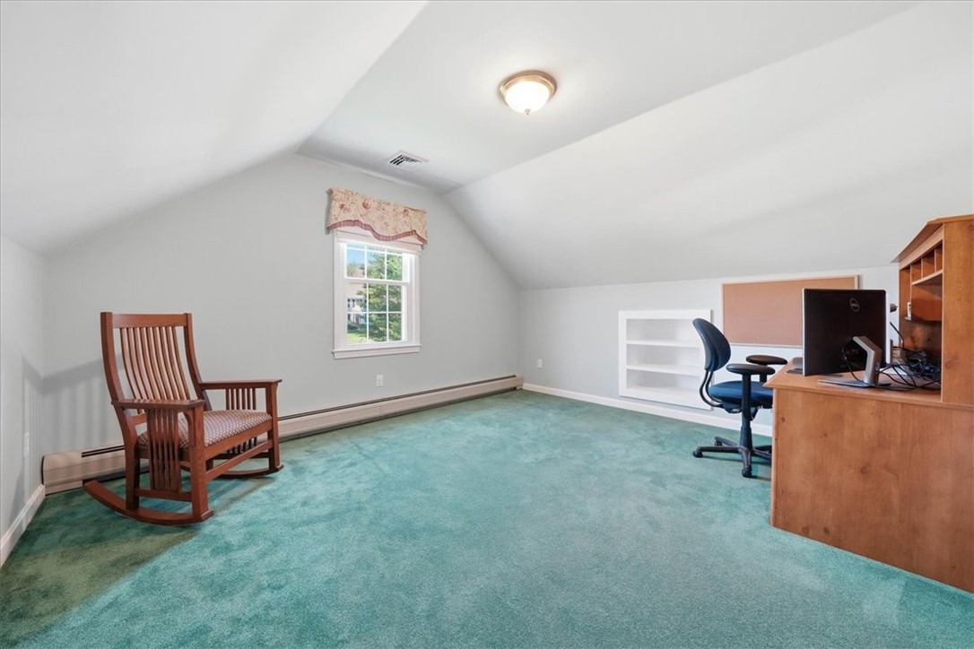 32 Lisa Lane Hopkinton, RI 02832 - Photo 36 of 50 Tucked away is a charming bonus space—ideal for a nursery, library, meditation room or private home office—creating a suite that feels both luxurious & deeply personal.