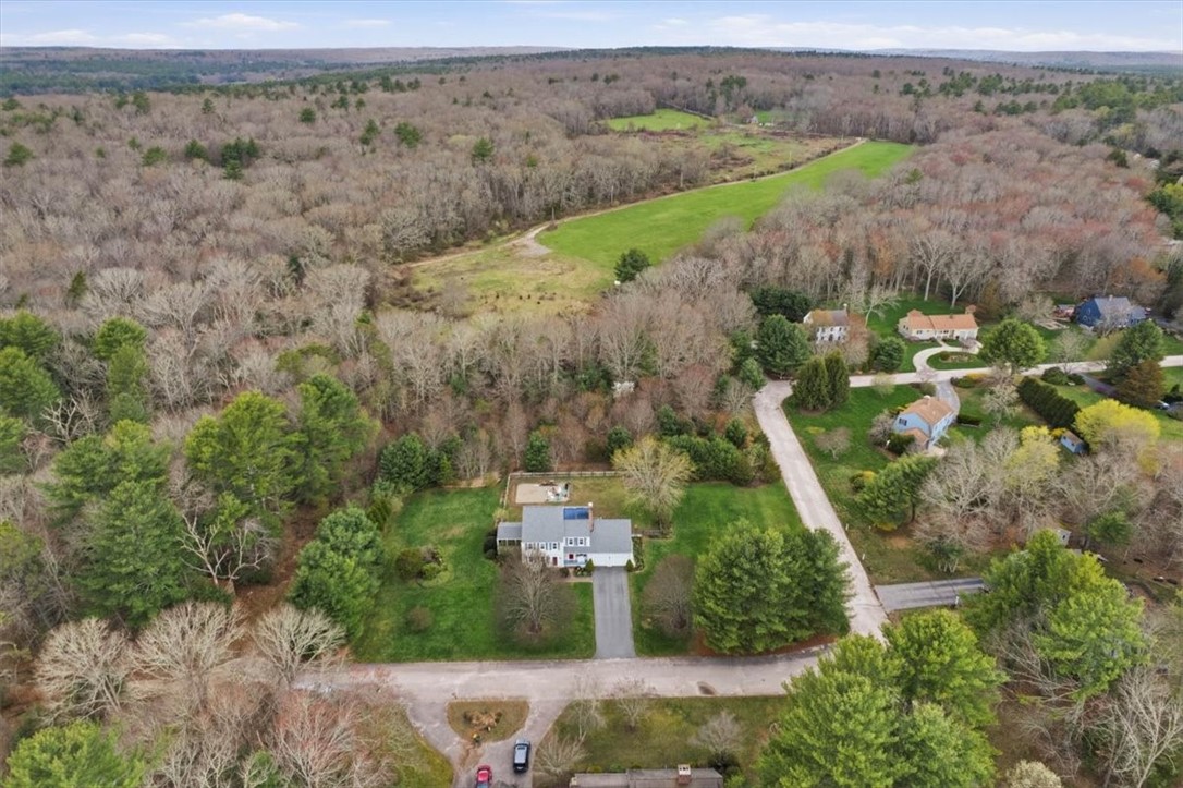 32 Lisa Lane Hopkinton, RI 02832 - Photo 4 of 50 Located just minutes from Arcadia Management Area, trails, parks, and major routes, this home offers a rare opportunity to enjoy both peaceful living and everyday convenience.