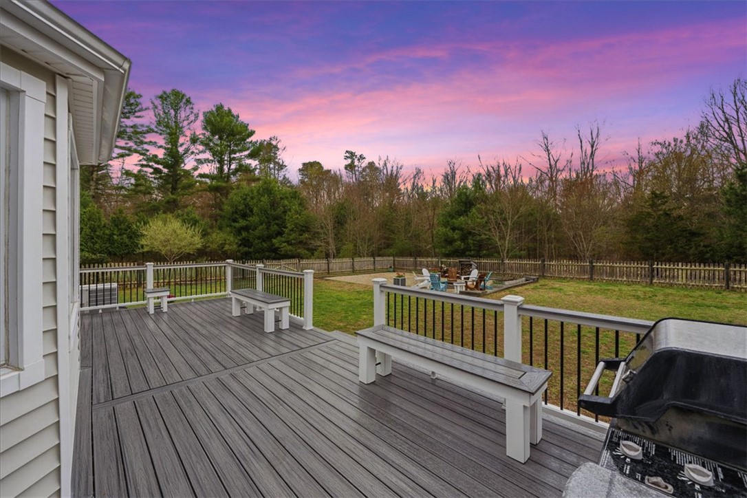 32 Lisa Lane Hopkinton, RI 02832 - Photo 46 of 50 Whether it’s summer nights by the fire or crisp fall mornings with coffee on the porch, this is a home that adapts beautifully to every season.