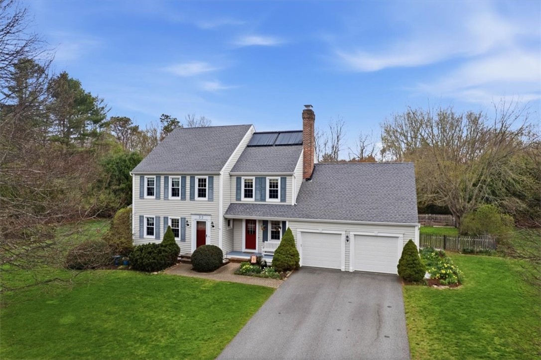 32 Lisa Lane Hopkinton, RI 02832 - Photo 5 of 50 With a huge 2-car garage, updated roof, windows, and premium mechanical systems, this home offers a rare opportunity for refined living in a sought-after location.
