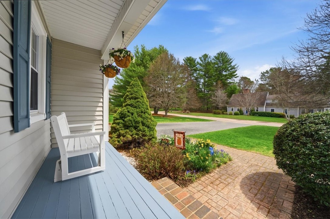 32 Lisa Lane Hopkinton, RI 02832 - Photo 6 of 50 Curb appeal! Charming porch, beautiful landscaping and brick walk-ways.