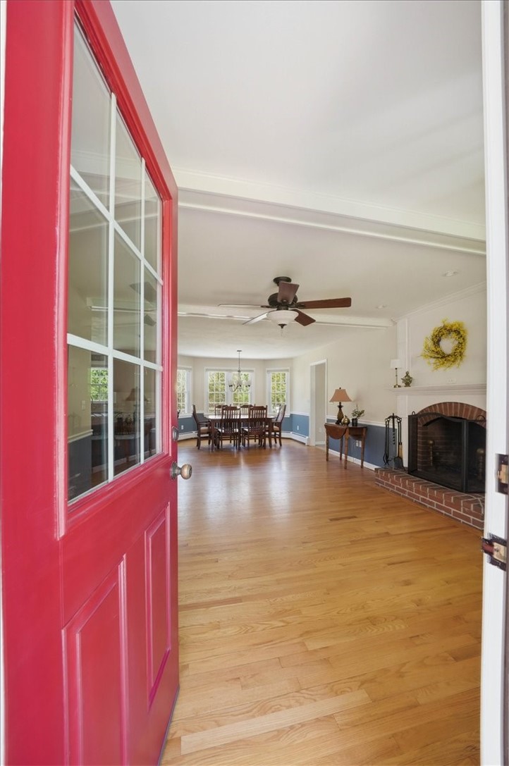 32 Lisa Lane Hopkinton, RI 02832 - Photo 7 of 50 The covered porch entry offers a more relaxed, everyday access point—bringing you directly into the heart of the home—an expansive, open living space featuring a fireplaced living room, generous dining area, and a spacious kitchen.