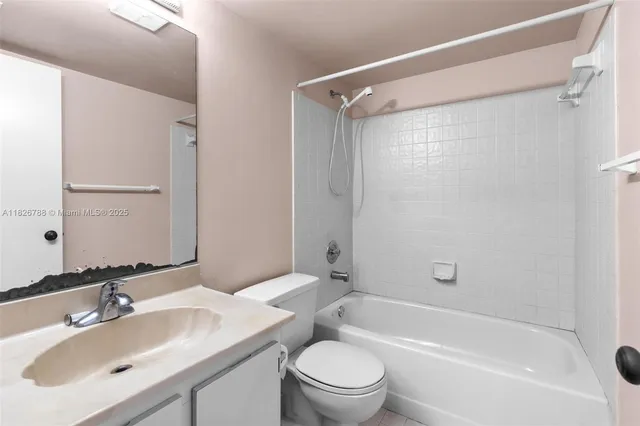 a view of a room with a large window