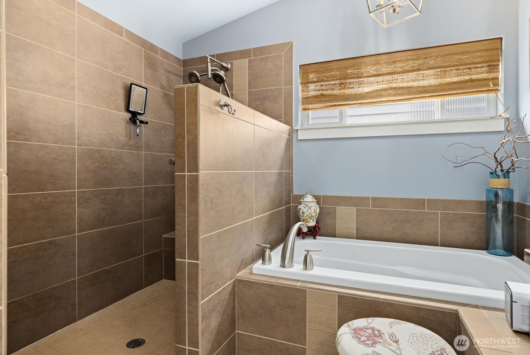 3414 33rd Avenue Southwest Seattle, WA 98126 - Photo 18 of 26 a bathroom with a sink and a shower