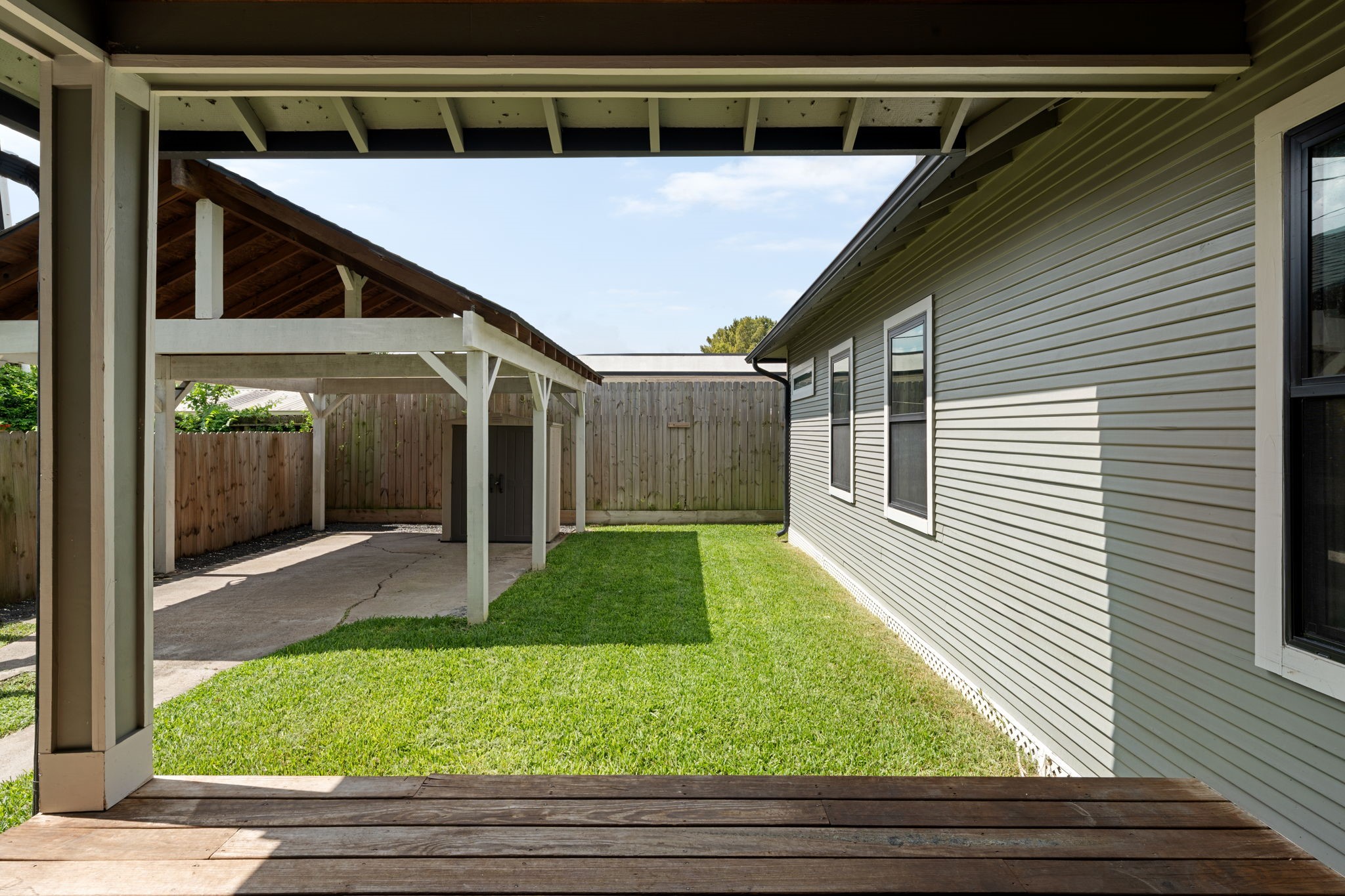 1022 Key Street Houston, TX 77009 - Photo 26 of 30 Step outside and discover a backyard designed for both relaxation and effortless hosting.