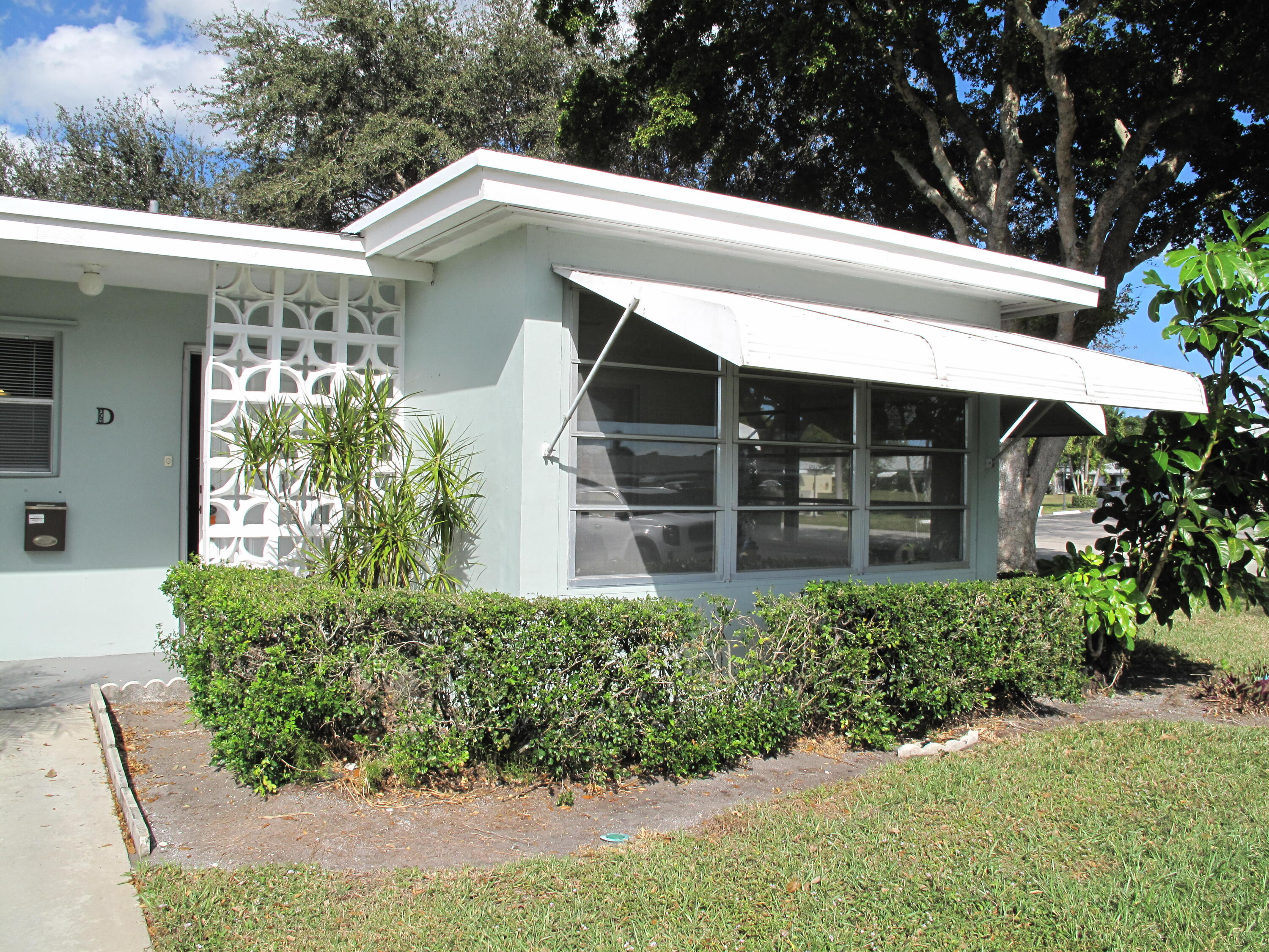 277 West High Point Court, Unit D Delray Beach, FL 33445 - Photo 1 of 47 Front view of corner villa