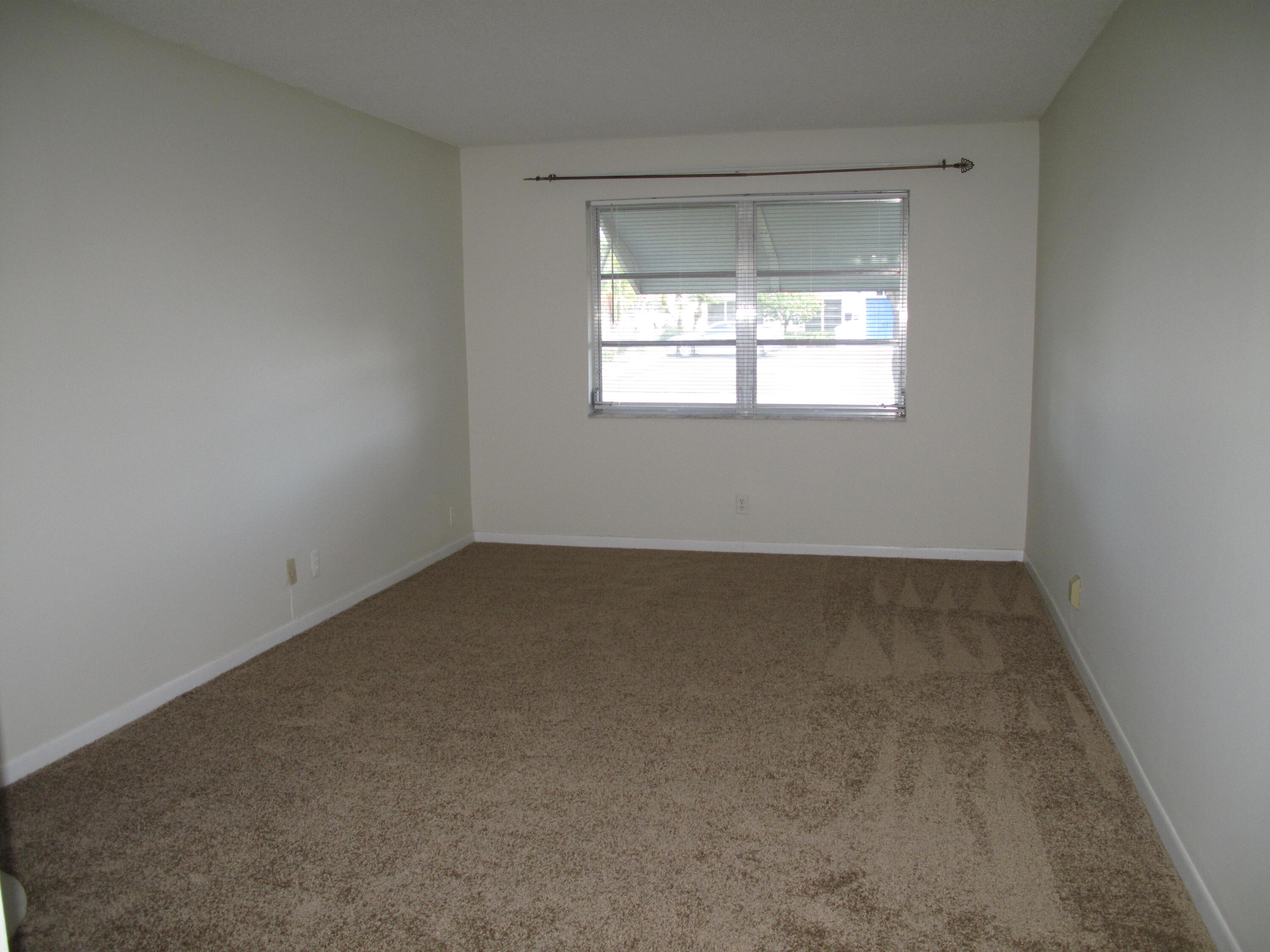 277 West High Point Court, Unit D Delray Beach, FL 33445 - Photo 24 of 47 Master bedroom