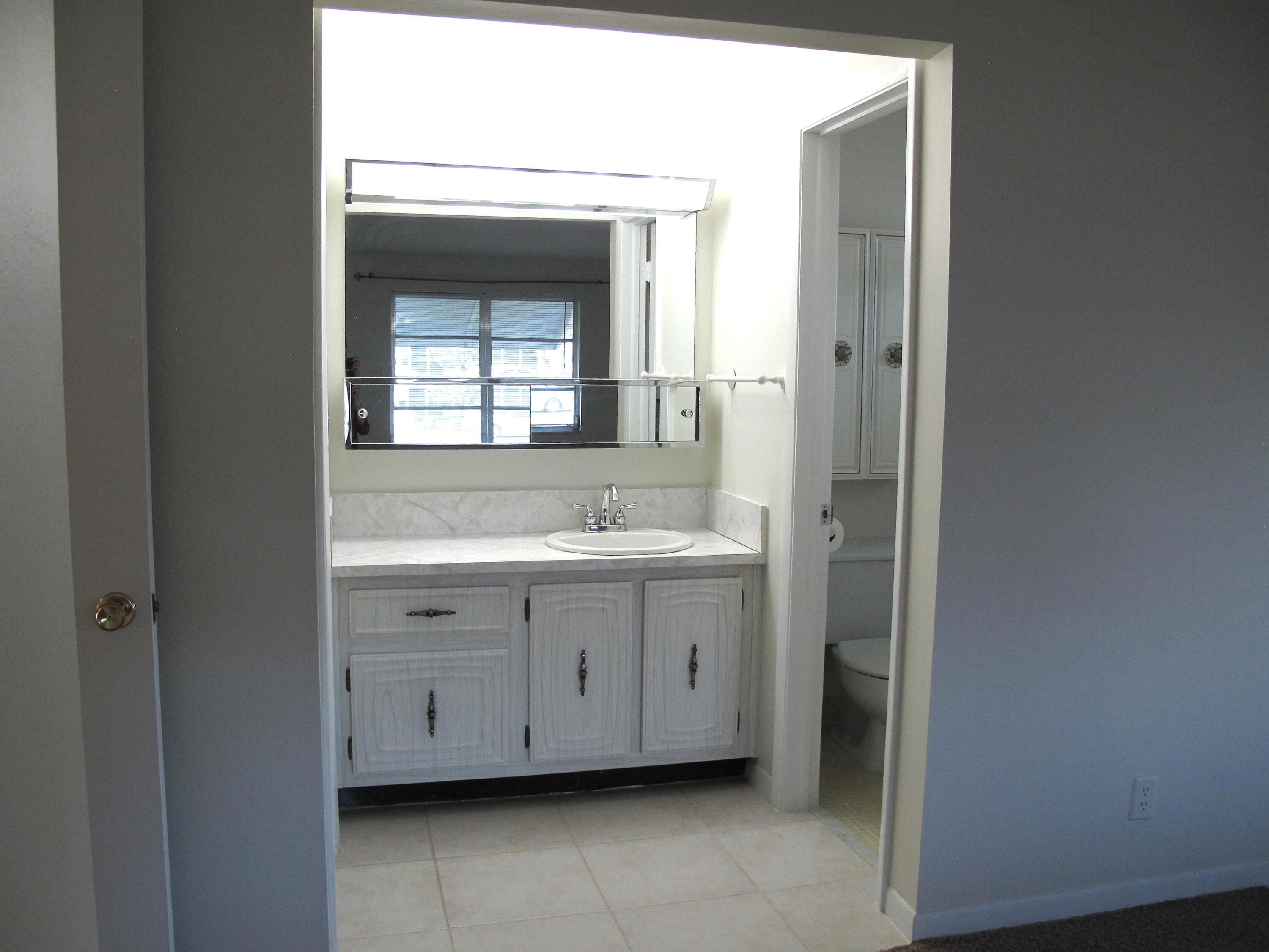 277 West High Point Court, Unit D Delray Beach, FL 33445 - Photo 25 of 47 Master bathroom