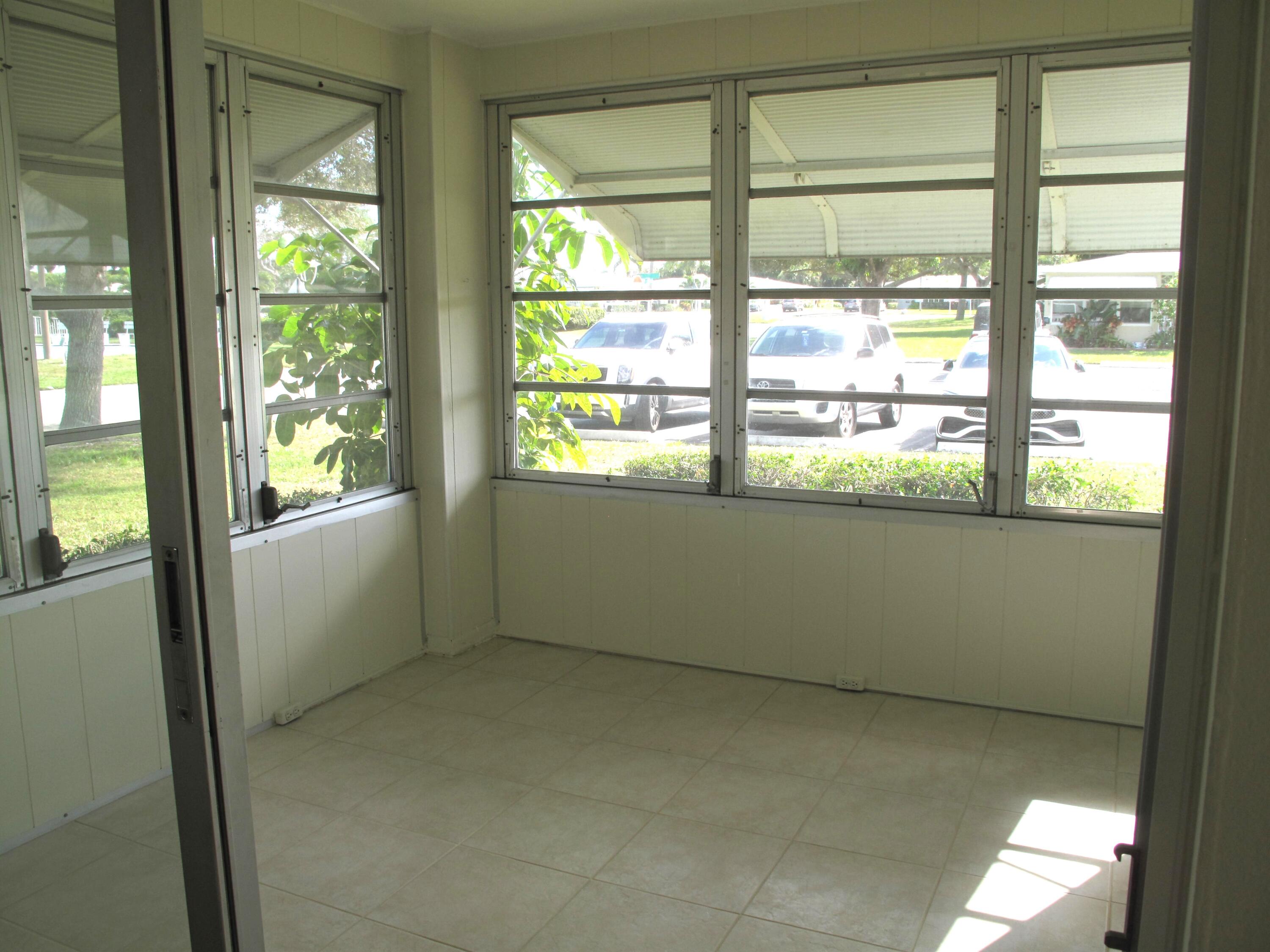 277 West High Point Court, Unit D Delray Beach, FL 33445 - Photo 3 of 47 Florida room