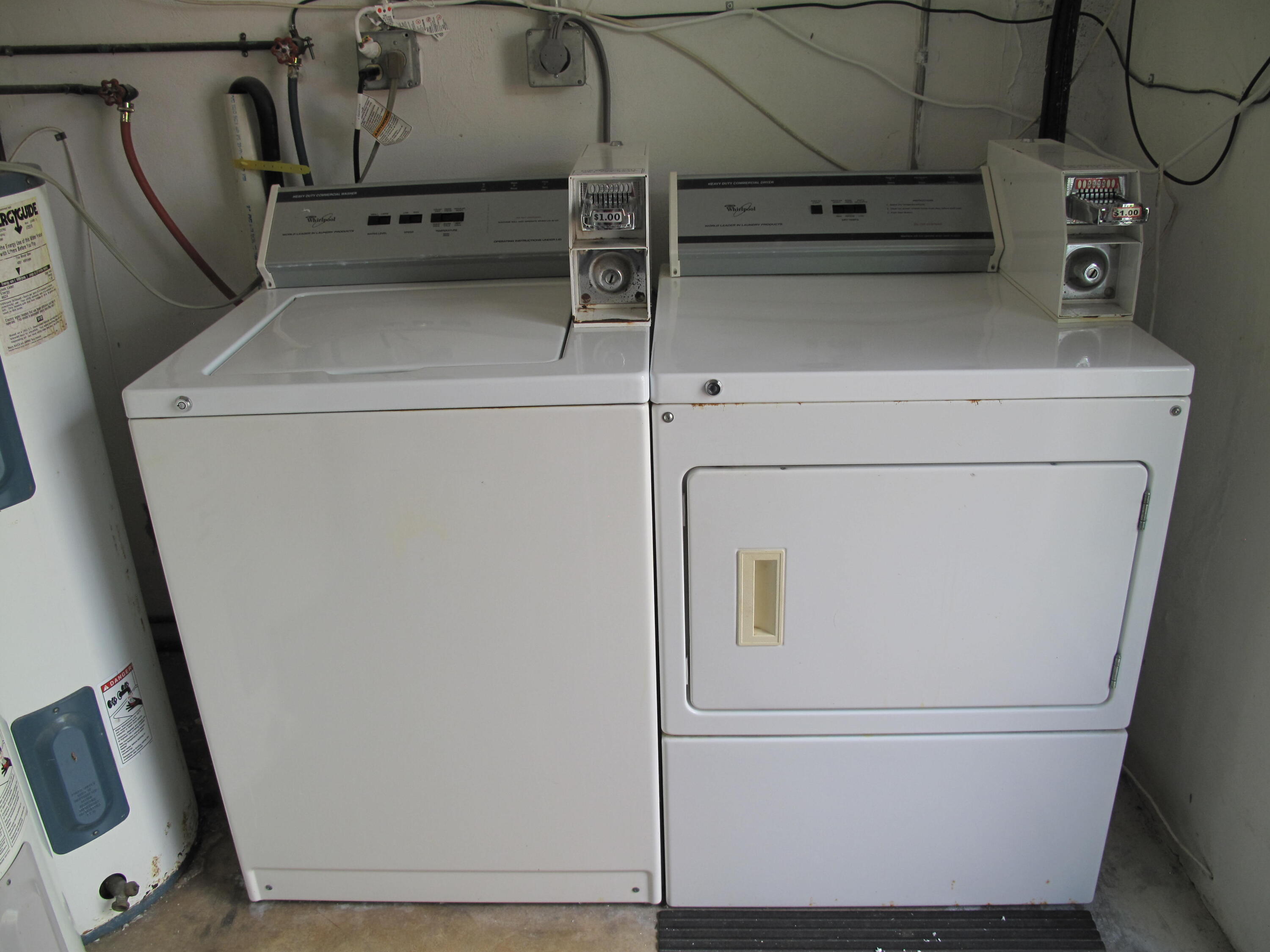 277 West High Point Court, Unit D Delray Beach, FL 33445 - Photo 32 of 47 Coin operated washer and dryer