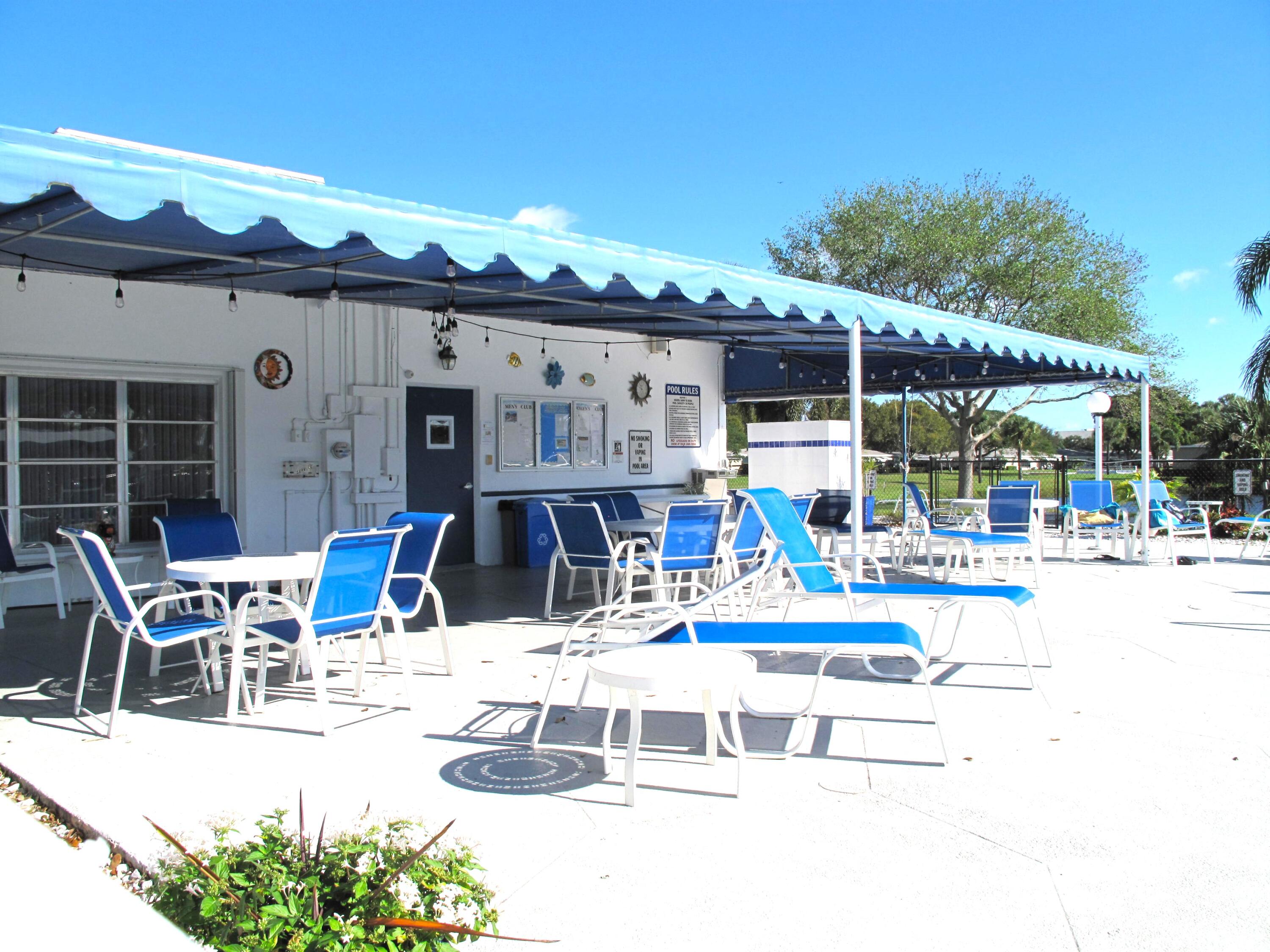 277 West High Point Court, Unit D Delray Beach, FL 33445 - Photo 42 of 47 Pool and deck area (4)