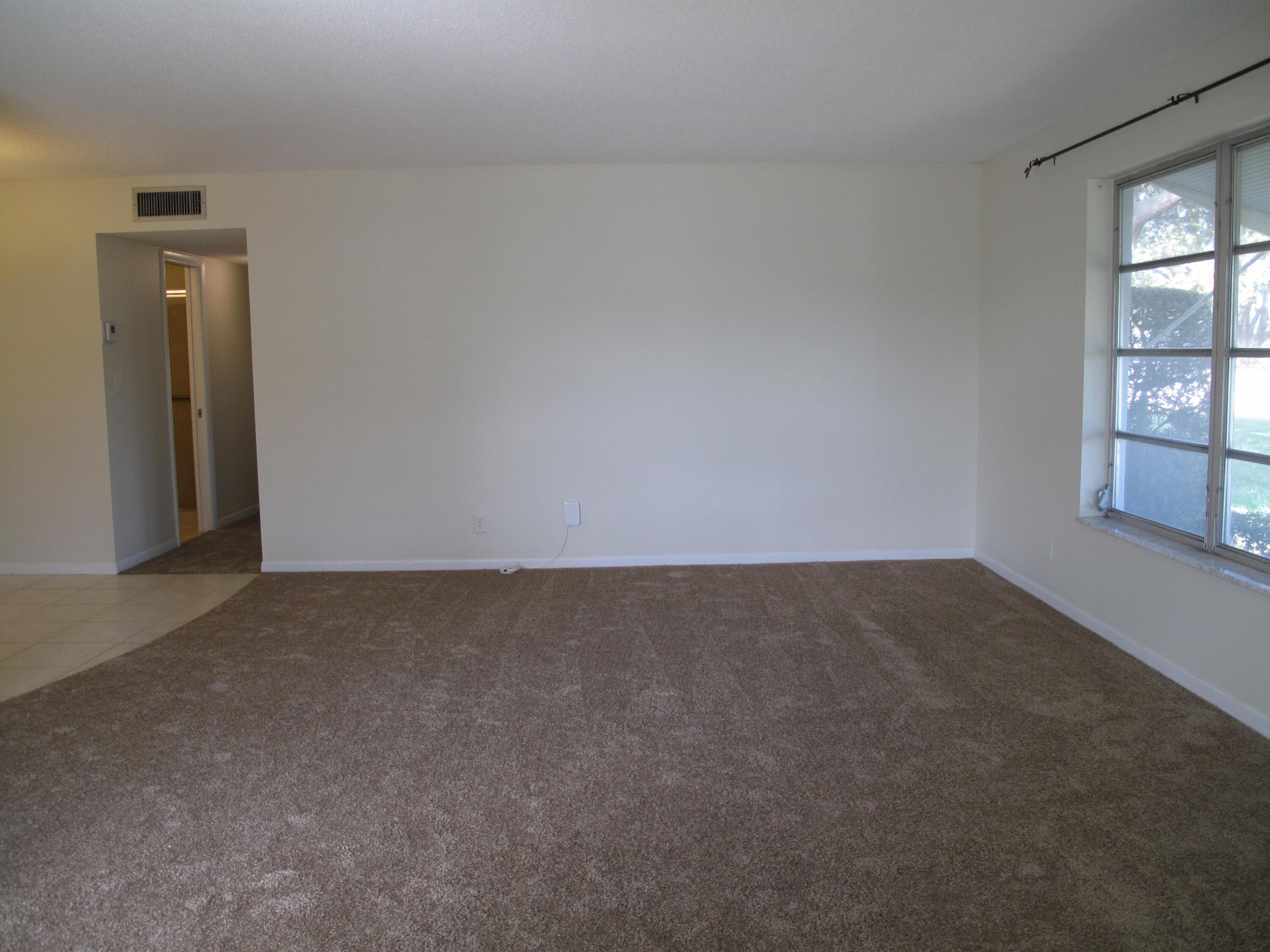 277 West High Point Court, Unit D Delray Beach, FL 33445 - Photo 10 of 47 living room