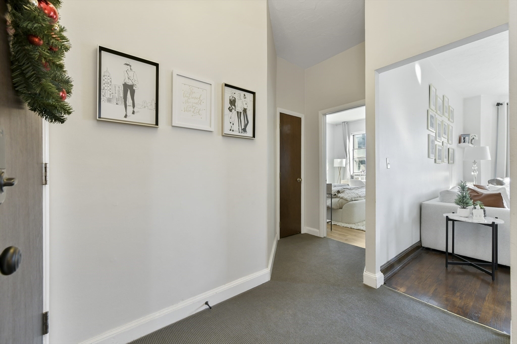 411 Marlborough Street, Unit 9 Boston, MA 02115 - Photo 15 of 20 a view of a hallway with interior of the house