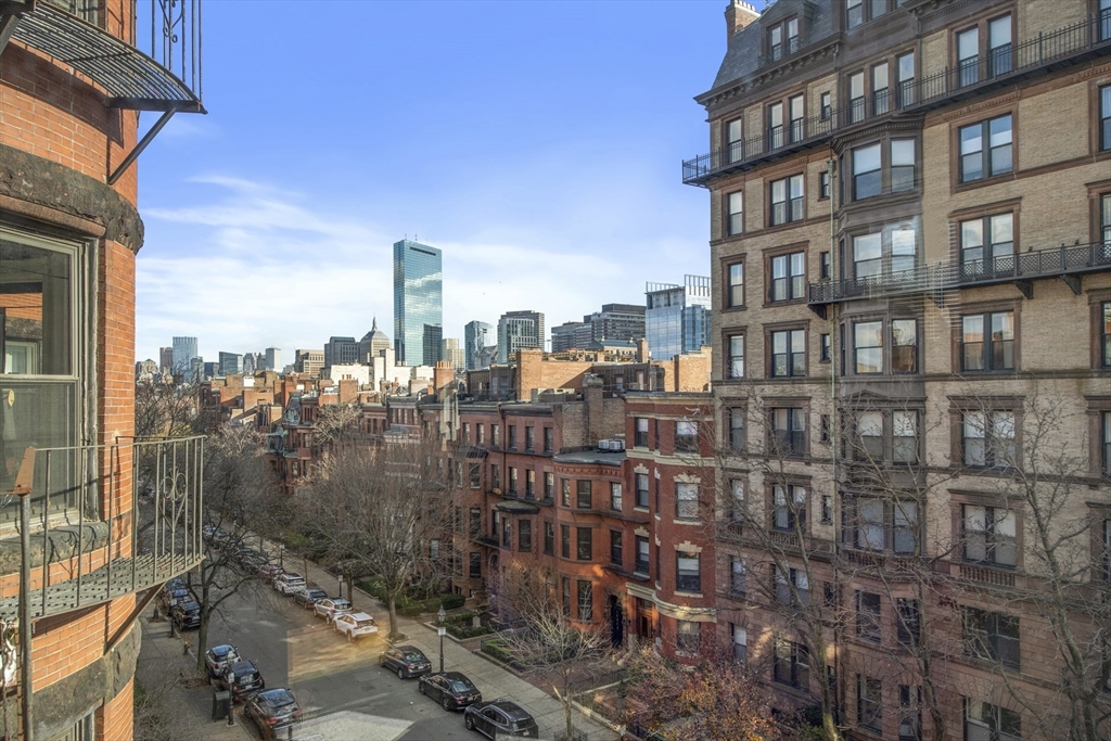 411 Marlborough Street, Unit 9 Boston, MA 02115 - Photo 18 of 20 a view of a city with tall buildings