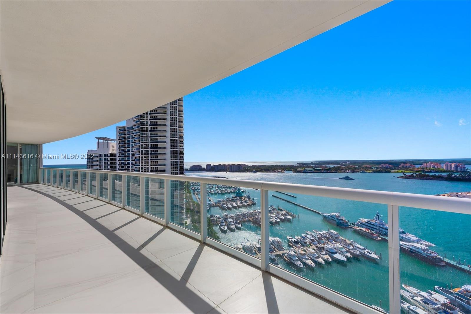 450 Alton Road, Unit 2301 Miami Beach, FL 33139 - Photo 18 of 21 a view of a balcony and an ocean view