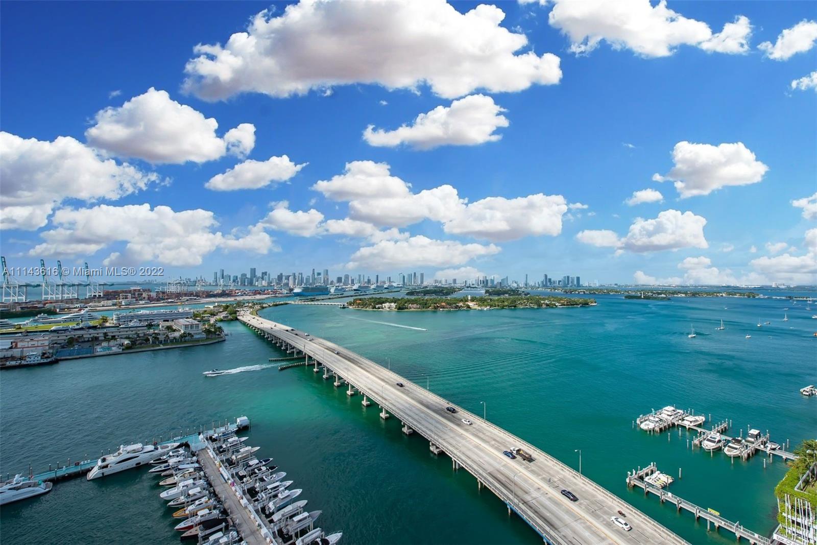 450 Alton Road, Unit 2301 Miami Beach, FL 33139 - Photo 20 of 21 a view of a lake with a city