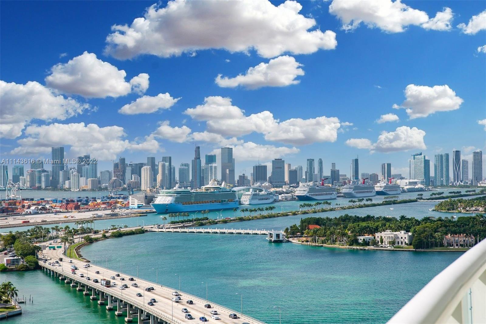 450 Alton Road, Unit 2301 Miami Beach, FL 33139 - Photo 21 of 21 a view of a lake with a city