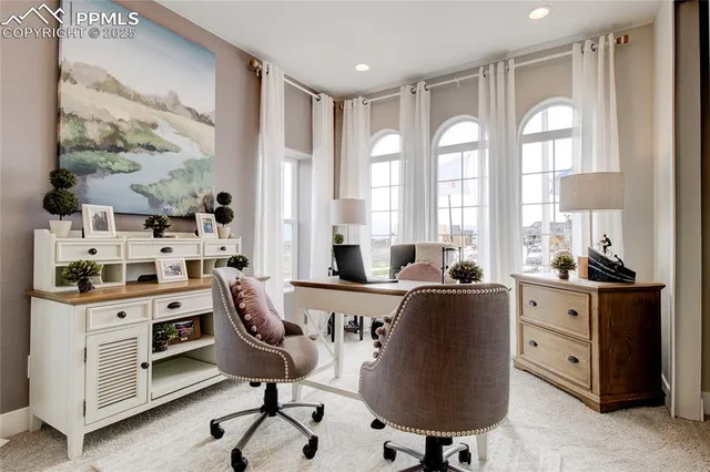 a living room with furniture window and a table