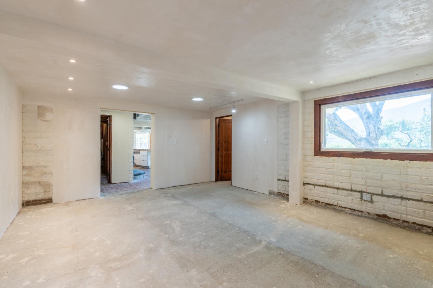 72 Los Laureles Grade Road Carmel Valley, CA 93924 - Photo 16 of 43 an empty room with windows