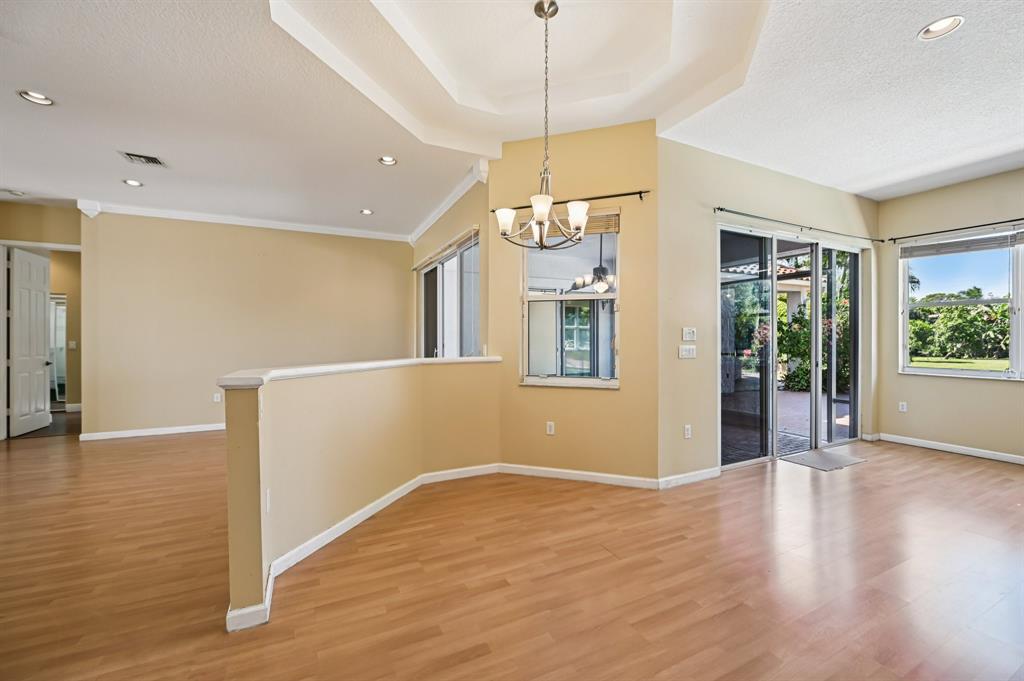 4181 Southwest 141st Avenue Davie, FL 33330 - Photo 14 of 61 a view of an empty room with wooden floor and a window