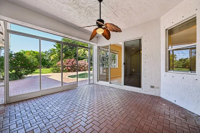 a bathroom with a sink toilet vanity and shower