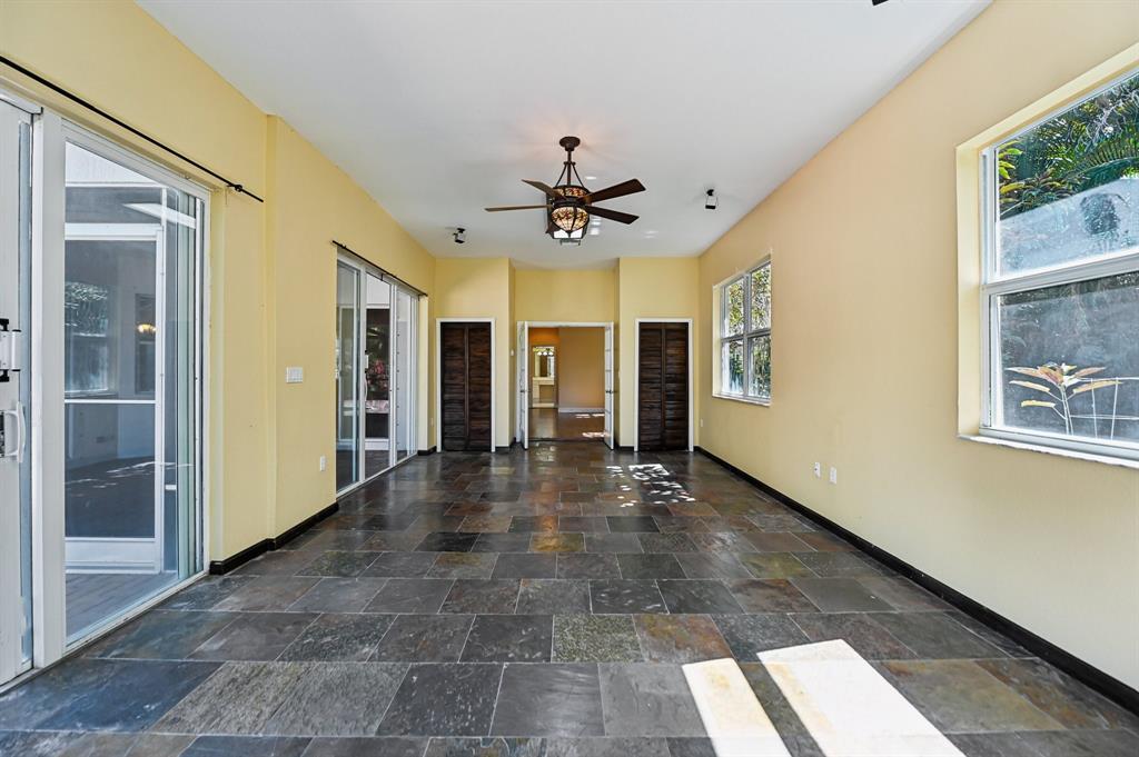 4181 Southwest 141st Avenue Davie, FL 33330 - Photo 24 of 61 a view of an entryway with a chandelier fan