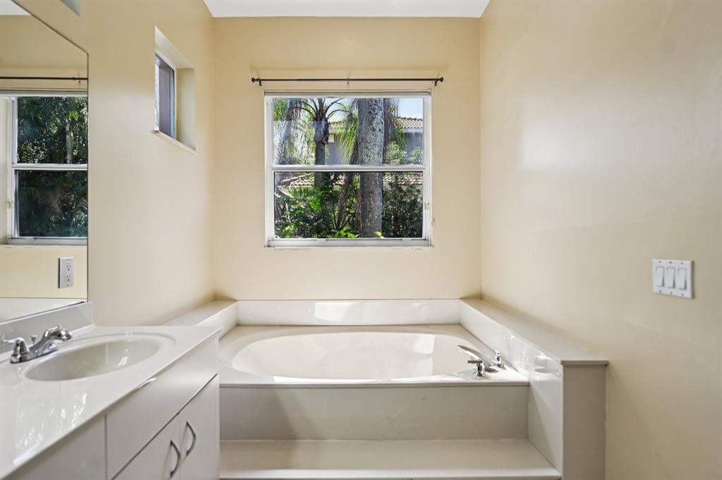 4181 Southwest 141st Avenue Davie, FL 33330 - Photo 29 of 61 a bath tub sitting next to a white sink