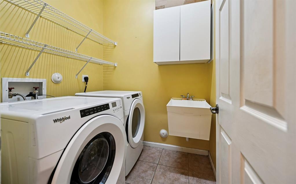 4181 Southwest 141st Avenue Davie, FL 33330 - Photo 32 of 61 a utility room with dryer and washer