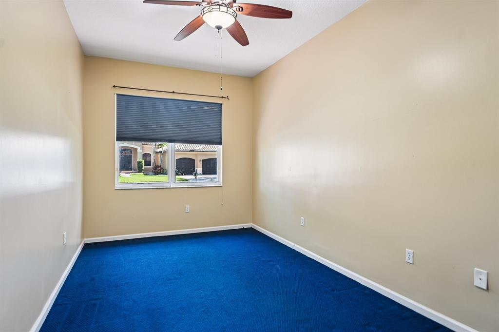 4181 Southwest 141st Avenue Davie, FL 33330 - Photo 33 of 61 an empty room with a window and wooden floor