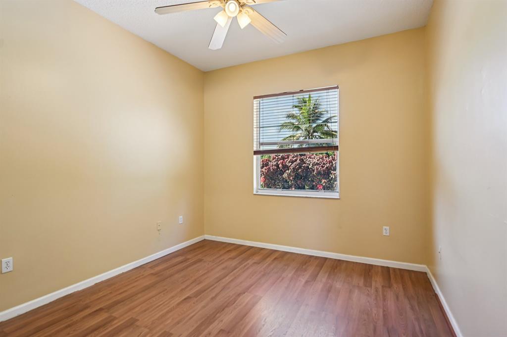 4181 Southwest 141st Avenue Davie, FL 33330 - Photo 37 of 61 an empty room with a window and wooden floor