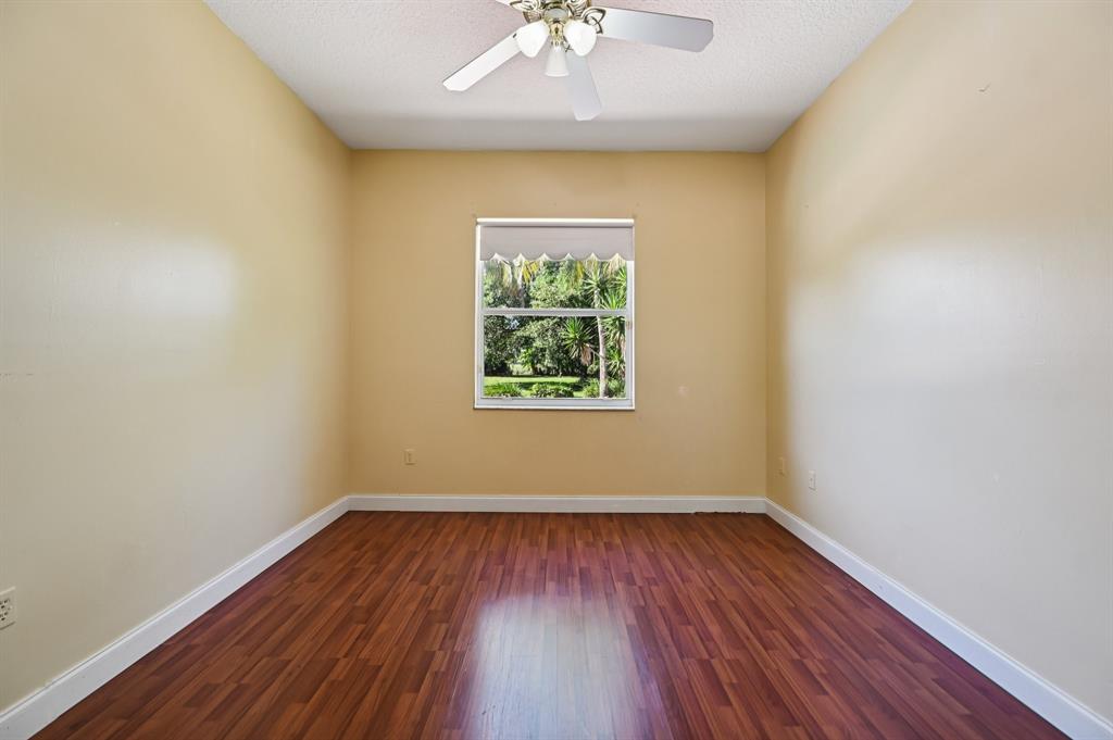 4181 Southwest 141st Avenue Davie, FL 33330 - Photo 40 of 61 wooden floor in an empty room with a window