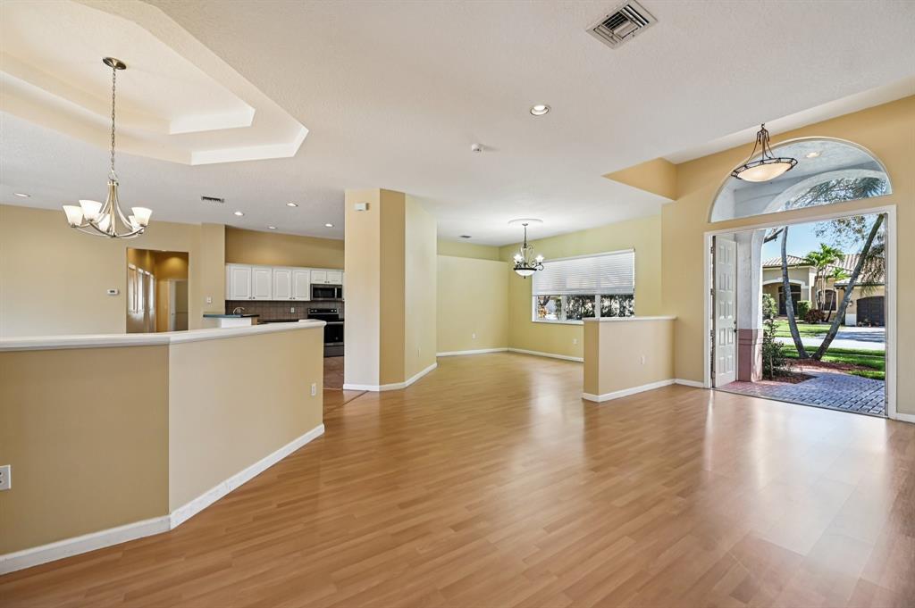 4181 Southwest 141st Avenue Davie, FL 33330 - Photo 5 of 61 a view of kitchen with cabinets and wooden floor