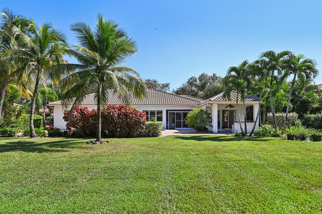 4181 Southwest 141st Avenue Davie, FL 33330 - Photo 51 of 61 a front view of house with yard and green space