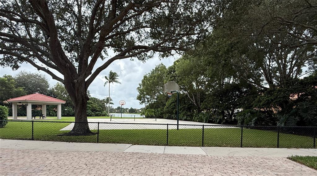 4181 Southwest 141st Avenue Davie, FL 33330 - Photo 61 of 61 a view of street with a house in the background