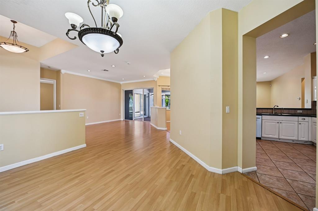 4181 Southwest 141st Avenue Davie, FL 33330 - Photo 8 of 61 a view of a kitchen from the hallway