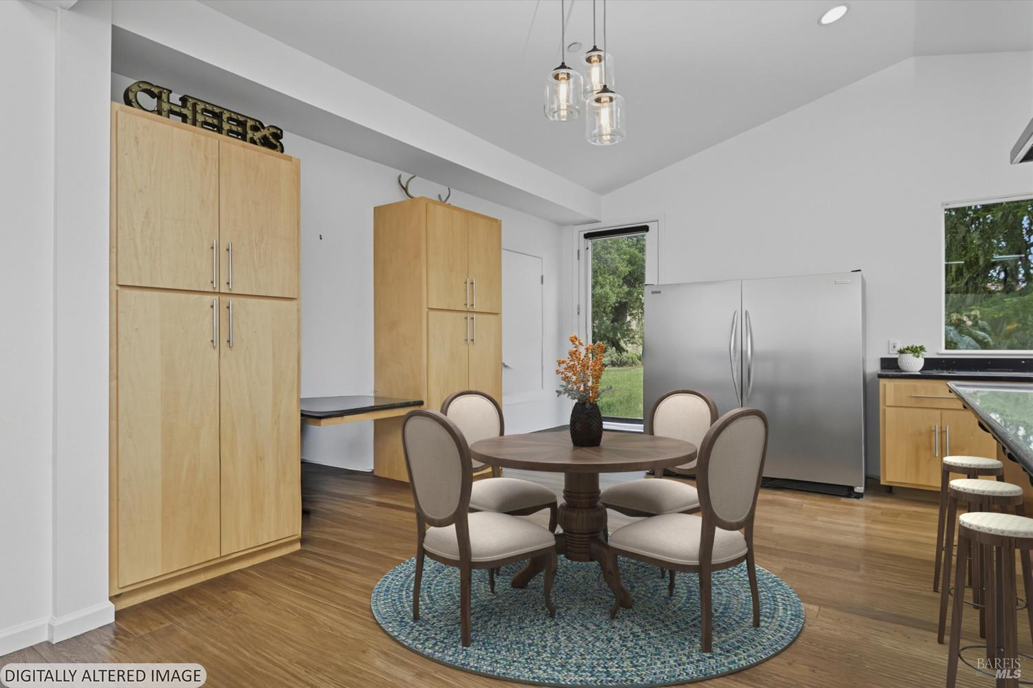 31000 Pine Mountain Road Cloverdale, CA 95425 - Photo 25 of 61 A convenient kitchenette that adds flexibility for guests, entertaining, or extended stays. Virtually staged dining area highlighting the spacious layout adjacent to the chef’s kitchen.
