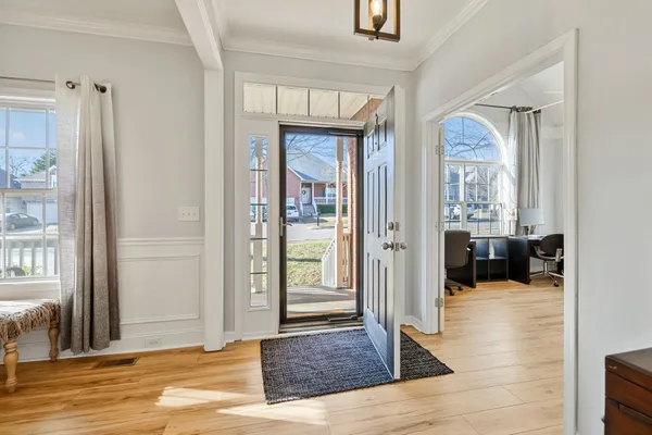 a view of a dining room with furniture window and outside view
