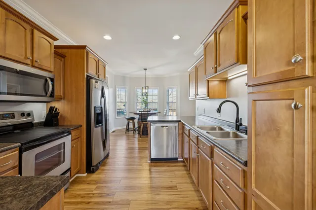 a bed room with a bed and a mirror