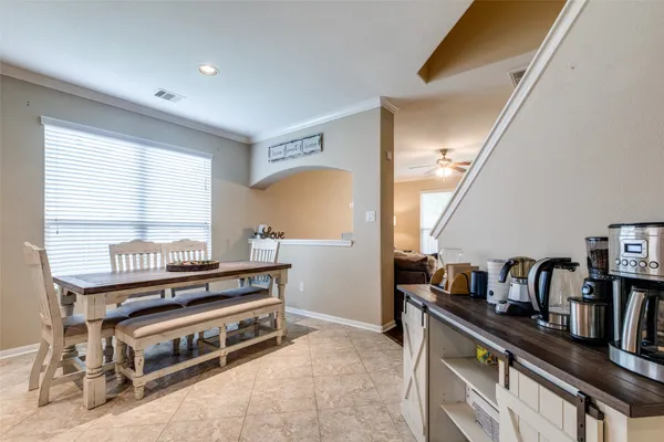 a view of workspace with furniture and window
