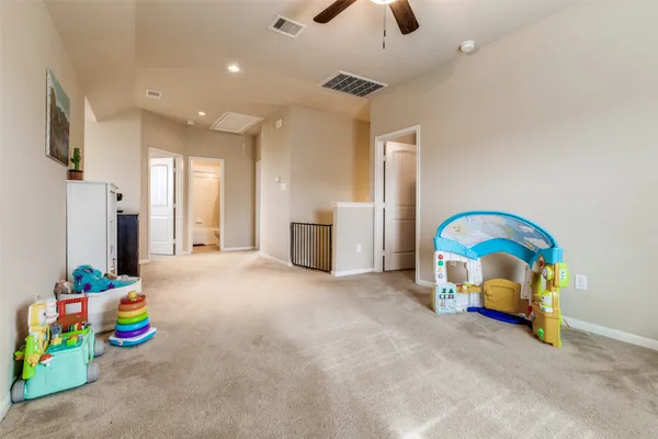 a bedroom with furniture and a couch