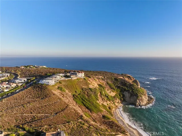 a view of a chairs and table in patio