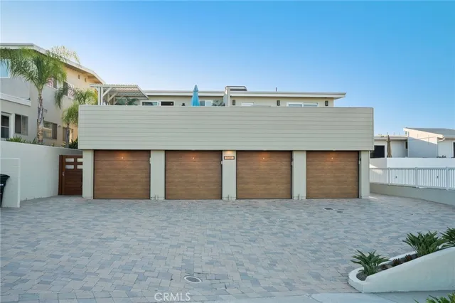 a kitchen with stainless steel appliances granite countertop a sink stove and wooden cabinets