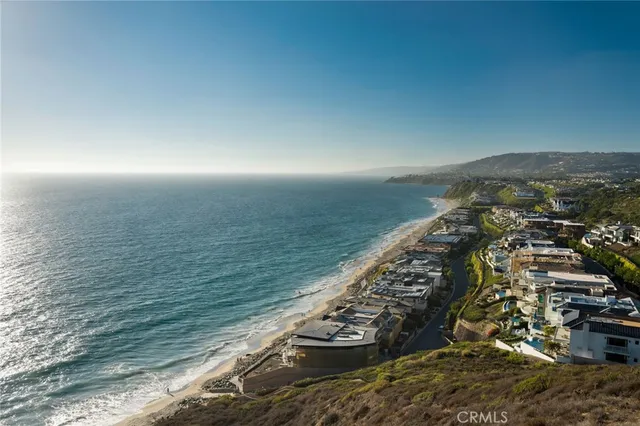 a view of a lake from a yard