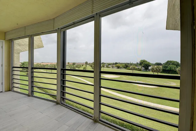 a view of a swimming pool and an outdoor space
