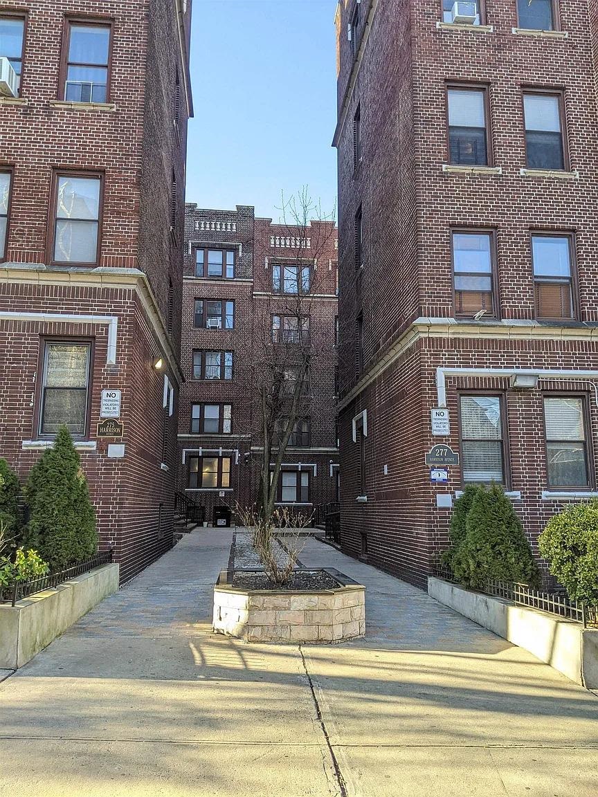 277 Harrison Avenue, Unit E4 Jersey City, NJ 07304 - Photo 12 of 13 a view of a building with a street