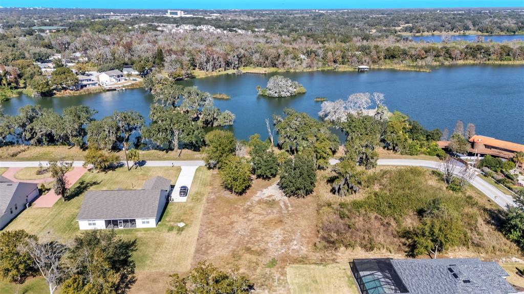 2577 Rogers Road Lakeland, FL 33812 - Photo 1 of 8 an aerial view of a house with a lake view
