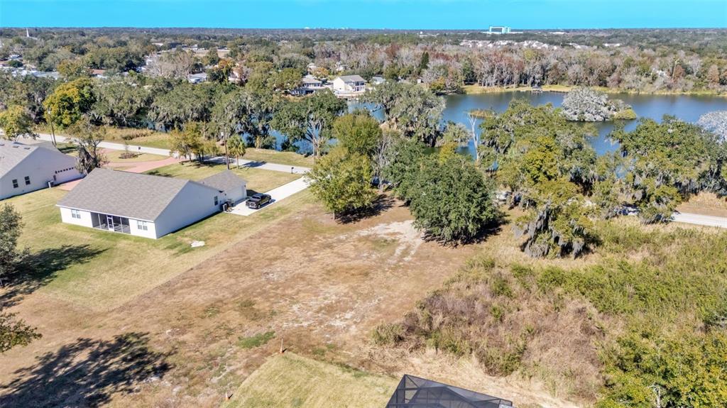 2577 Rogers Road Lakeland, FL 33812 - Photo 3 of 8 a view of a lake with beach and city view