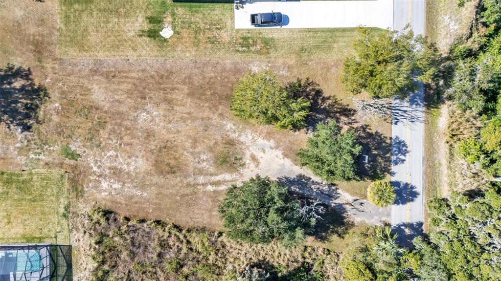 2577 Rogers Road Lakeland, FL 33812 - Photo 4 of 8 a view of a lake with a building